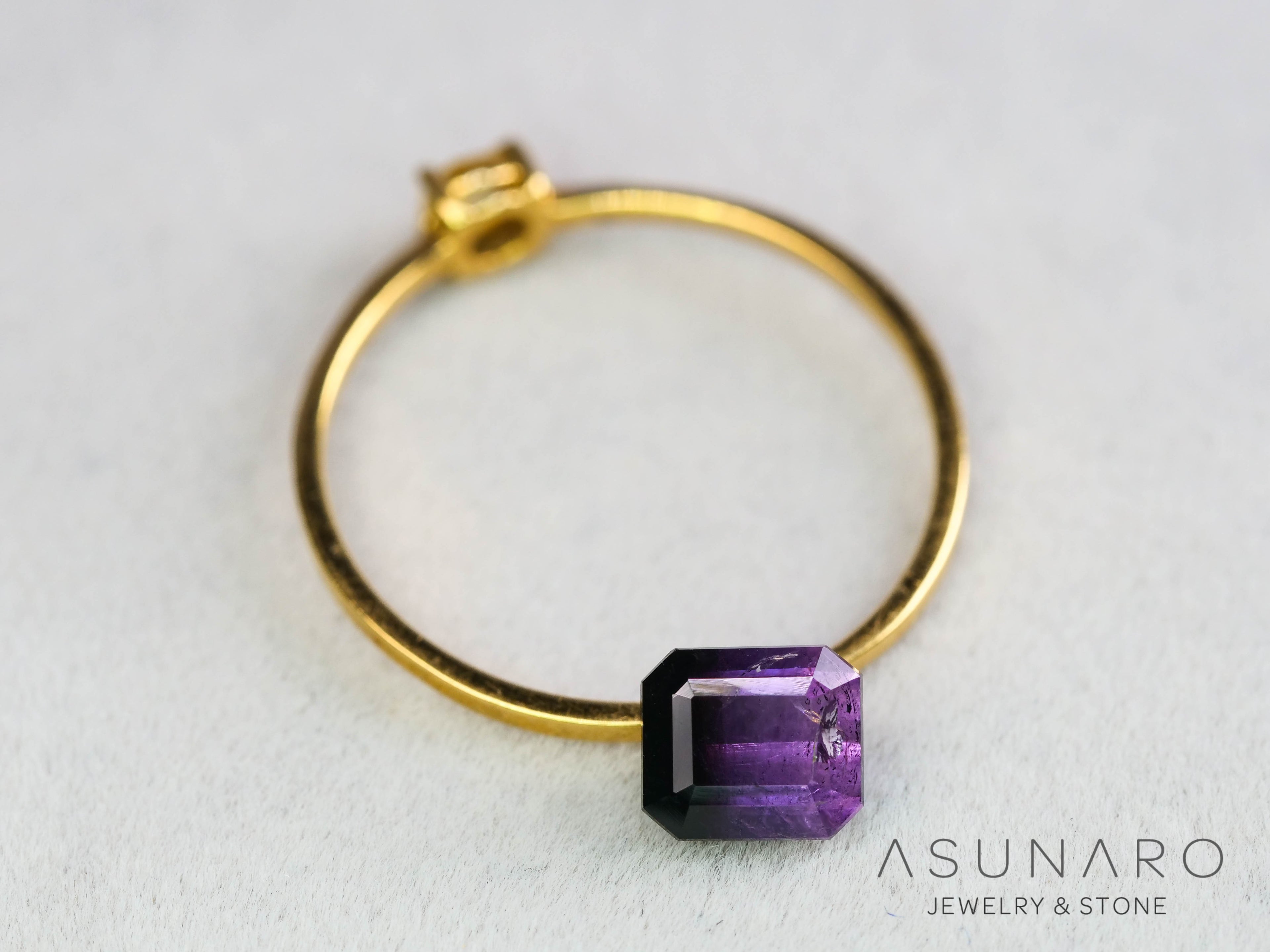 パープルバイカラートルマリン　エメラルドカット　アフガニスタン産　0.85ct【251121-3013】
