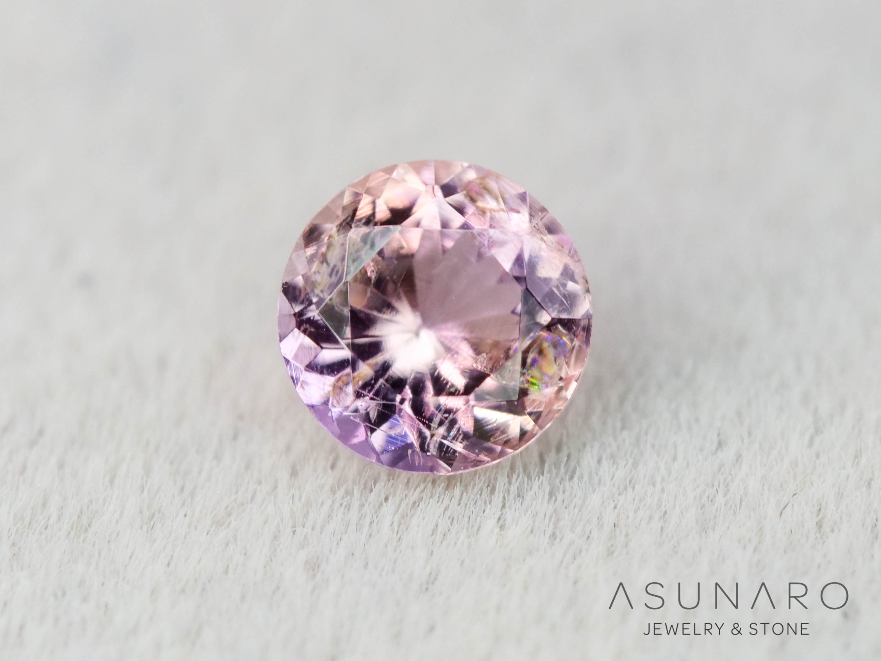 インペリアルトパーズ　ラウンドカット　0.18ct　ブラジル産　【251127-3055】