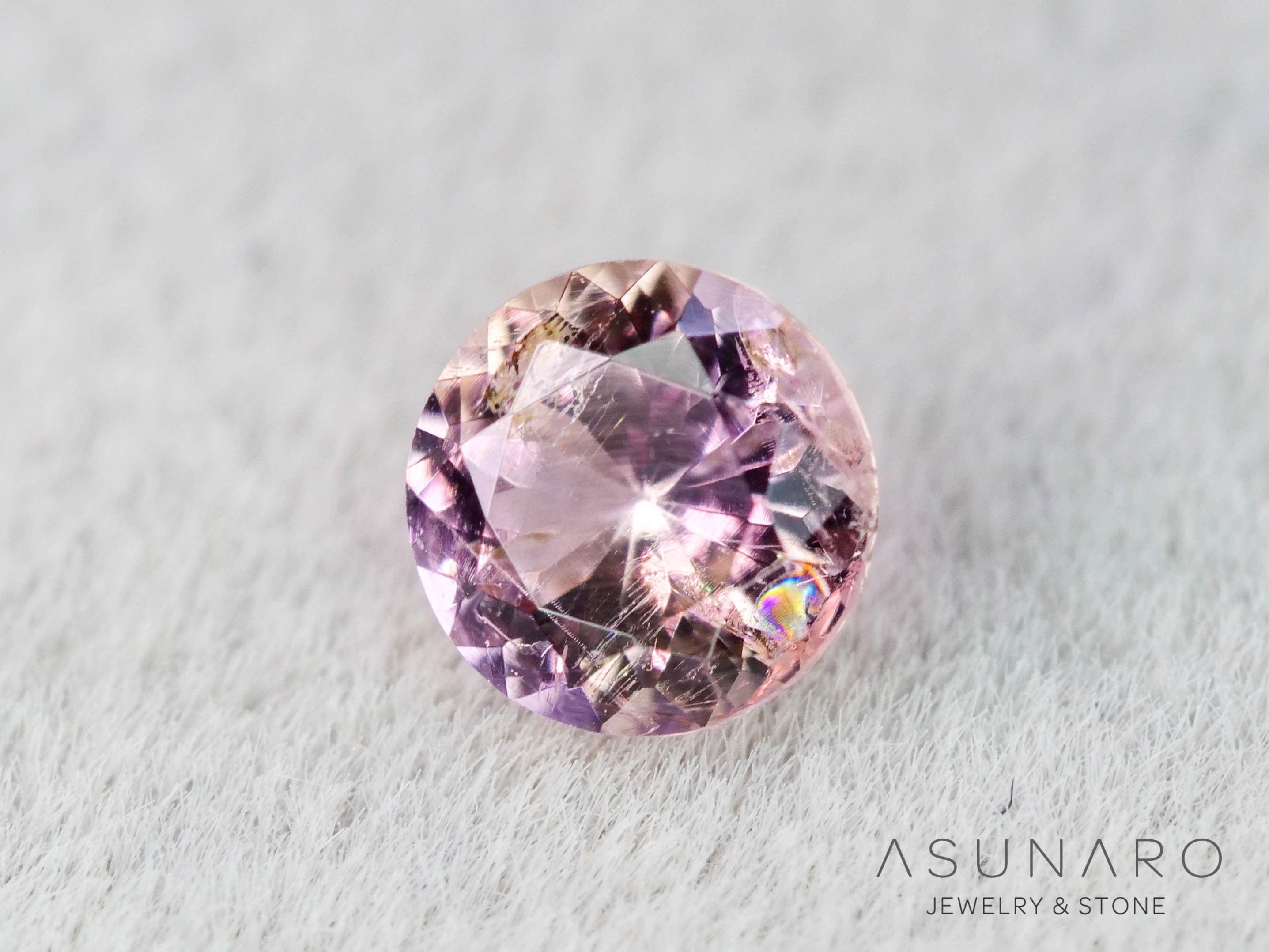 インペリアルトパーズ　ラウンドカット　0.18ct　ブラジル産　【251127-3055】