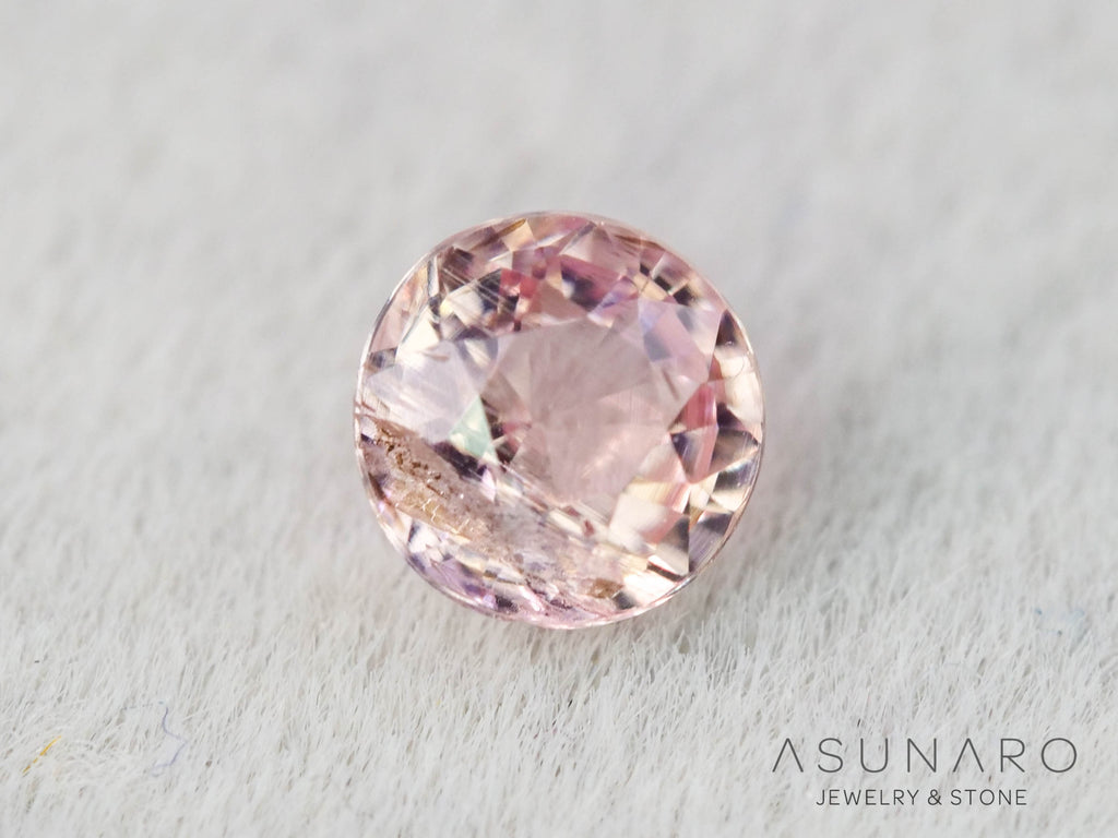 インペリアルトパーズ　ラウンドカット　0.19ct　ブラジル産　【251127-3054】