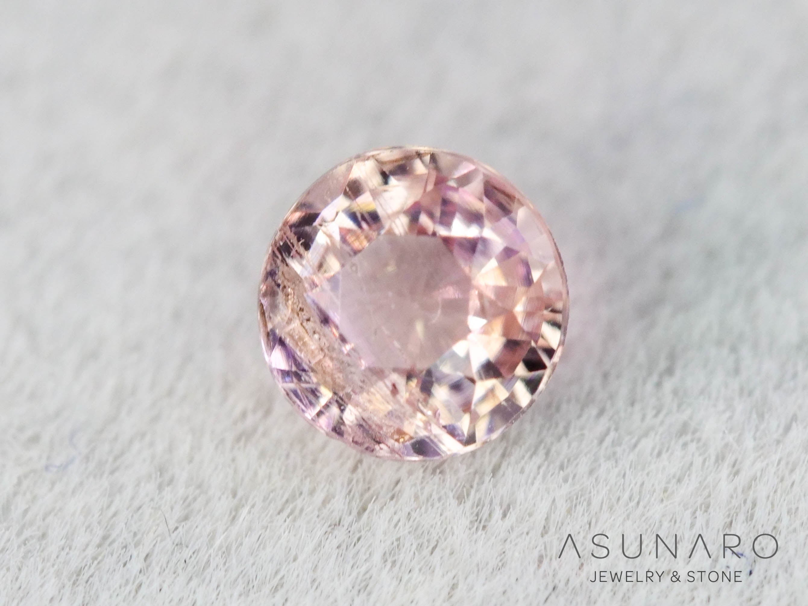 インペリアルトパーズ　ラウンドカット　0.19ct　ブラジル産　【251127-3054】