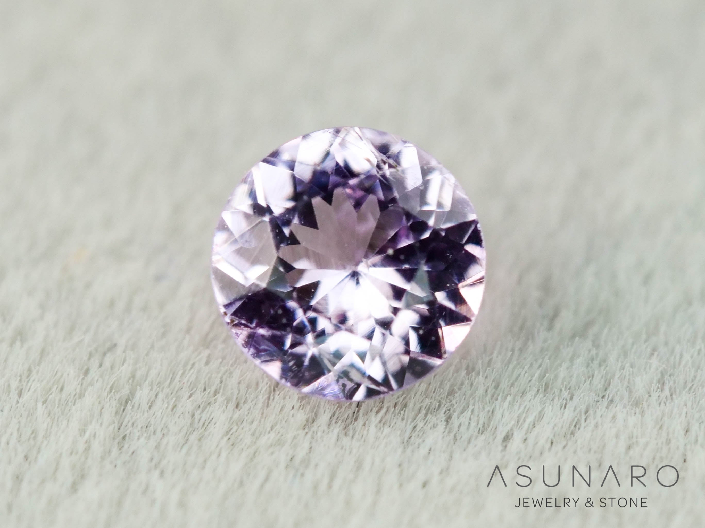 インペリアルトパーズ　ラウンドカット　0.17ct　ブラジル産　【251127-3053】