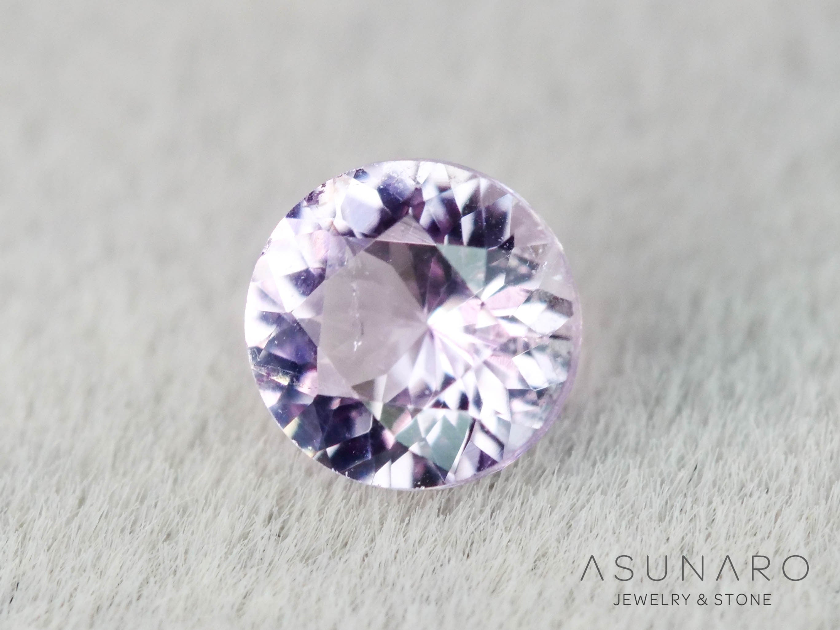 インペリアルトパーズ　ラウンドカット　0.18ct　ブラジル産　【251127-3052】