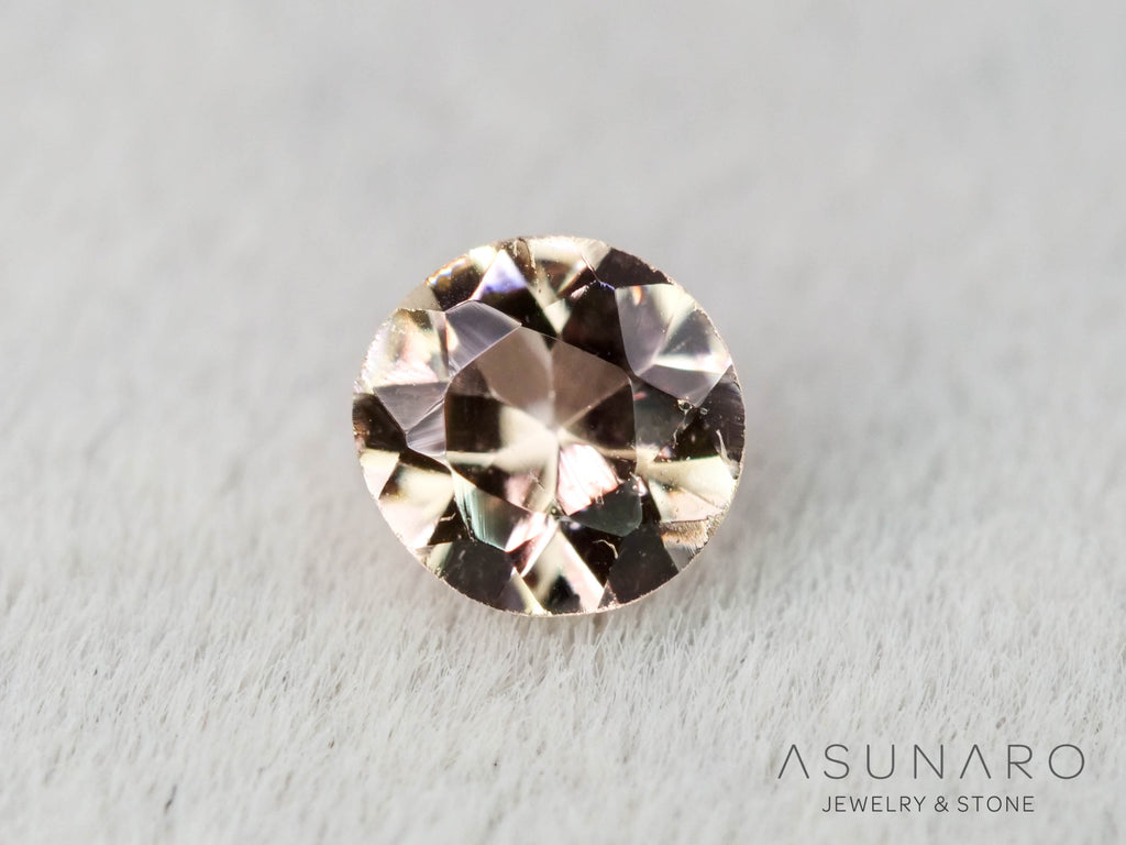 インペリアルトパーズ　ラウンドカット　0.16ct　ブラジル産　【251127-3051】