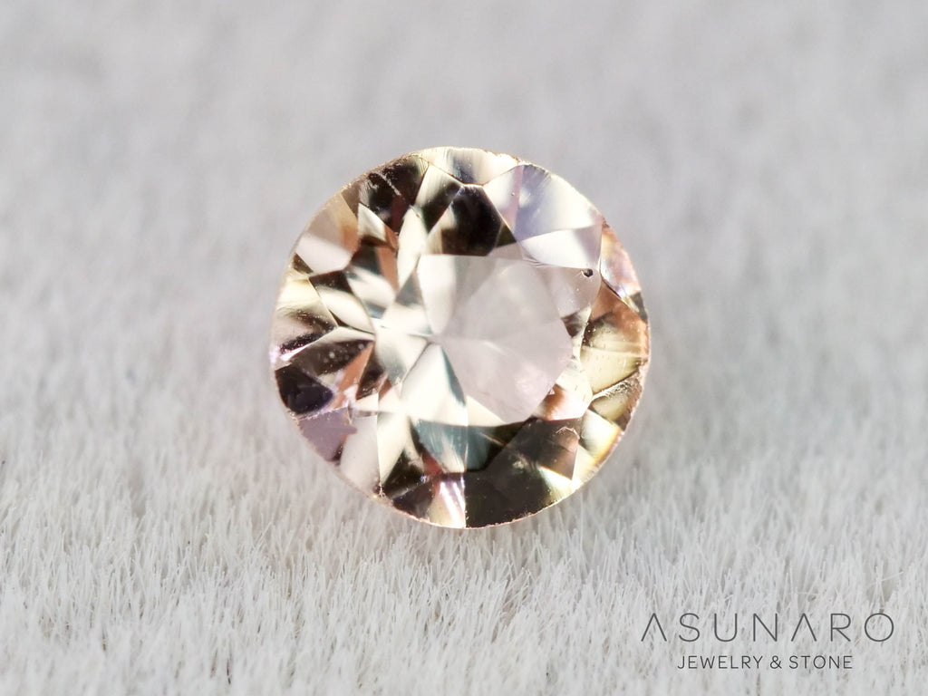 インペリアルトパーズ　ラウンドカット　0.16ct　ブラジル産　【251127-3051】