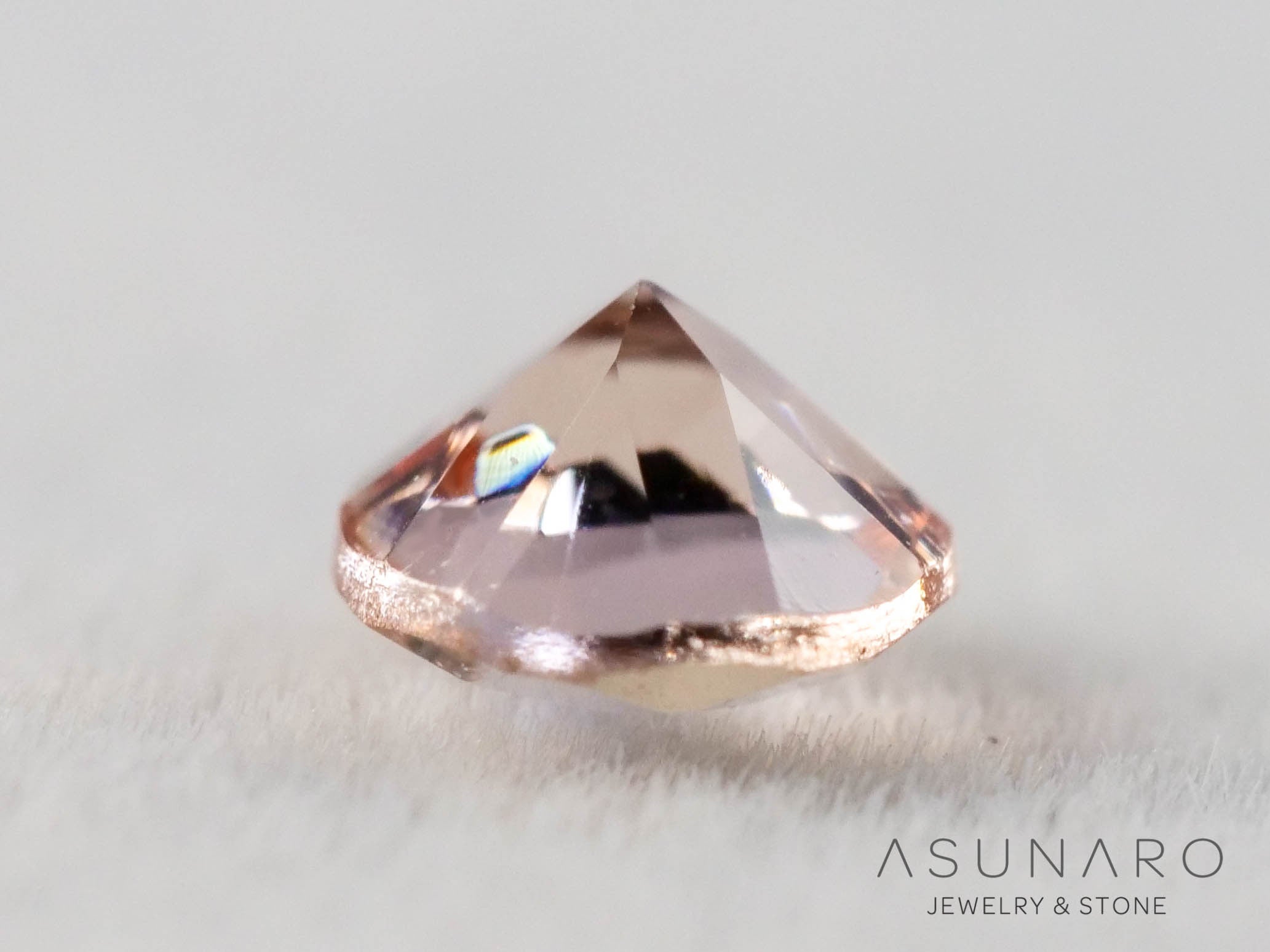 インペリアルトパーズ　ラウンドカット　0.16ct　ブラジル産　【251127-3051】