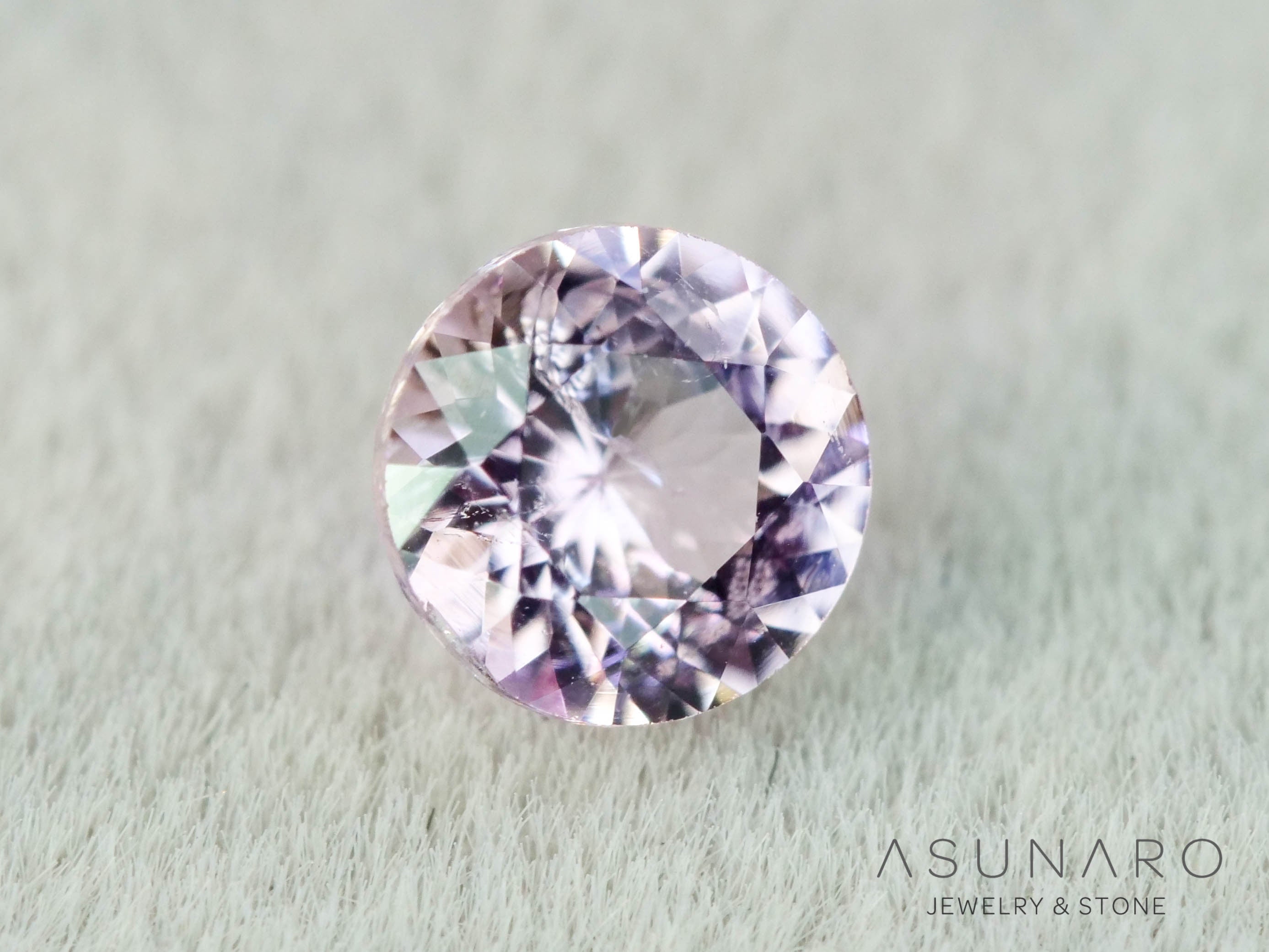 インペリアルトパーズ　ラウンドカット　0.19ct　ブラジル産　【251127-3050】