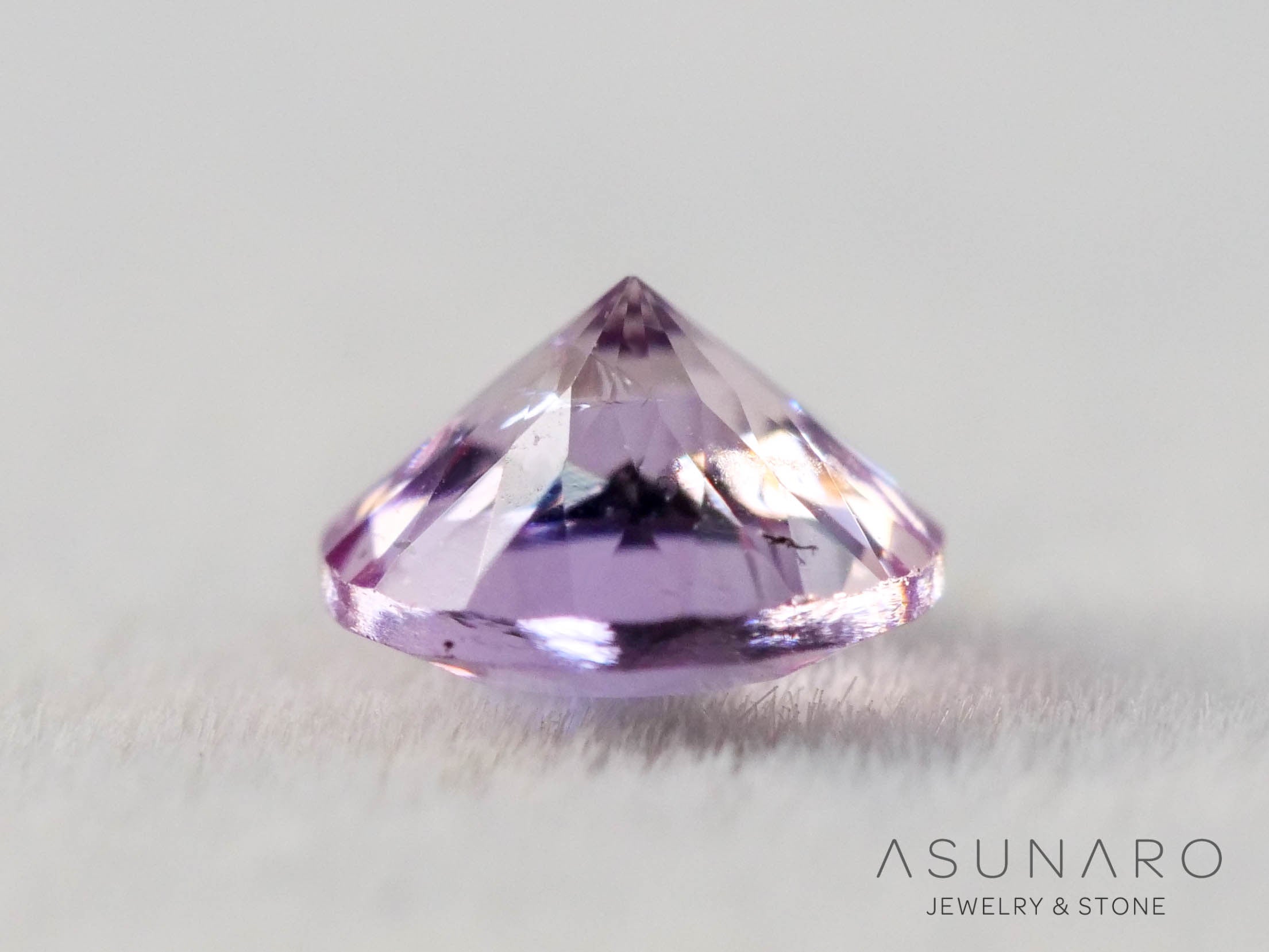 インペリアルトパーズ　ラウンドカット　0.19ct　ブラジル産　【251127-3050】