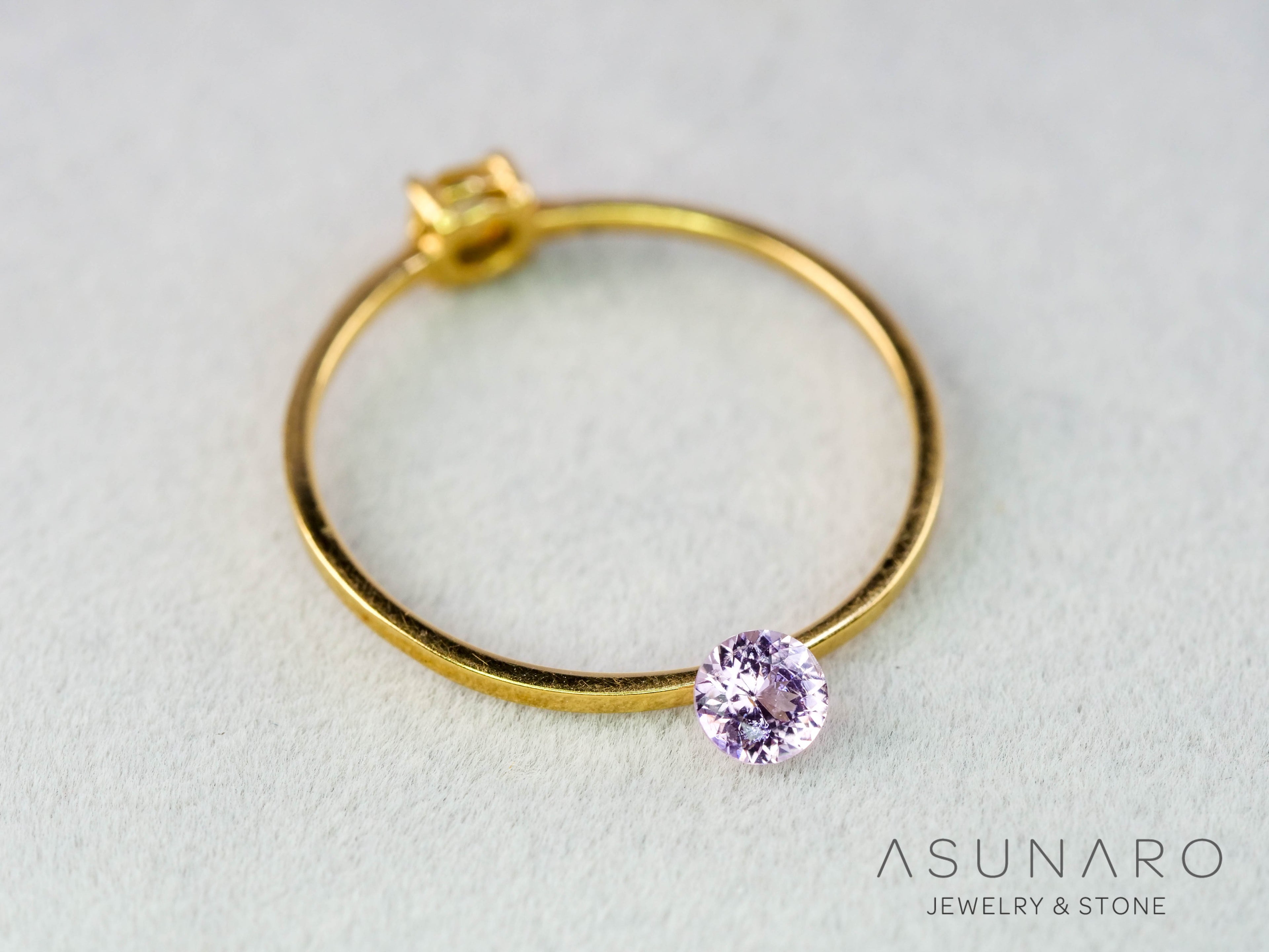 インペリアルトパーズ　ラウンドカット　0.19ct　ブラジル産　【251127-3050】