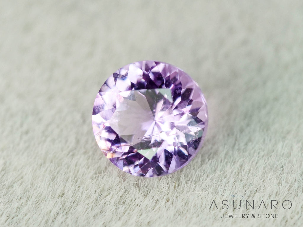 インペリアルトパーズ　ラウンドカット　0.18ct　ブラジル産　【251127-3049】