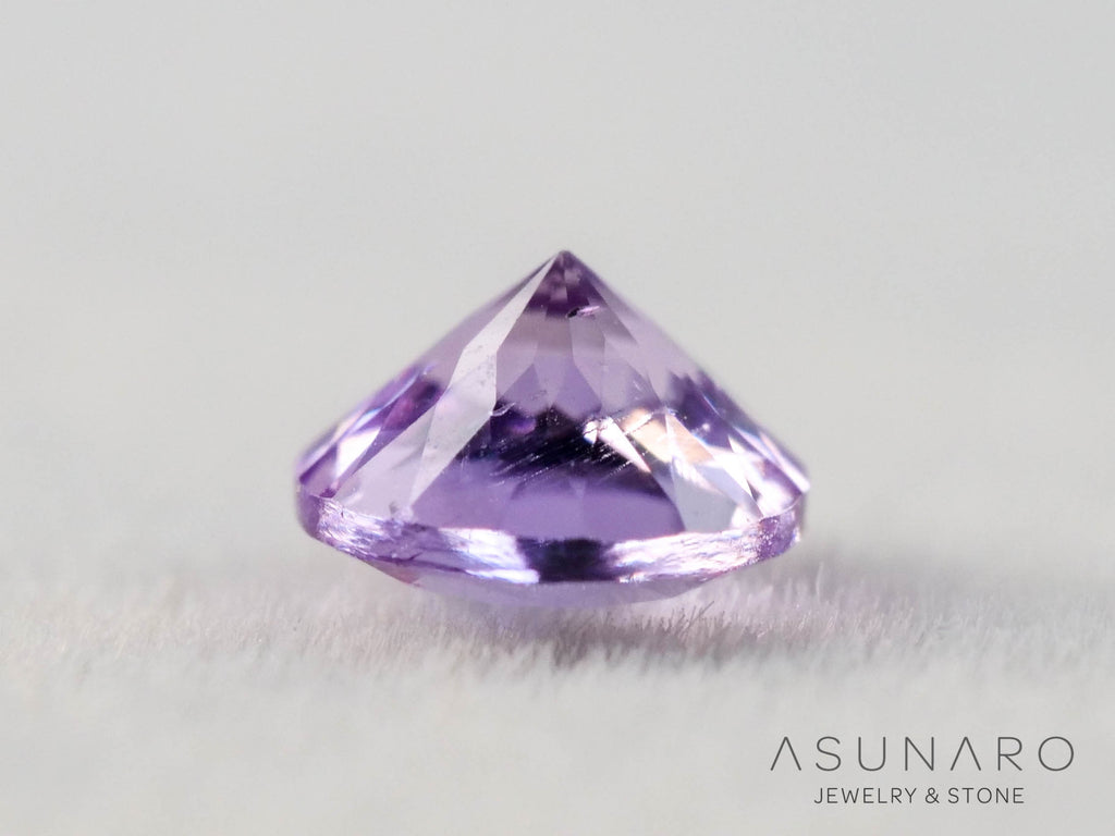 インペリアルトパーズ　ラウンドカット　0.18ct　ブラジル産　【251127-3049】