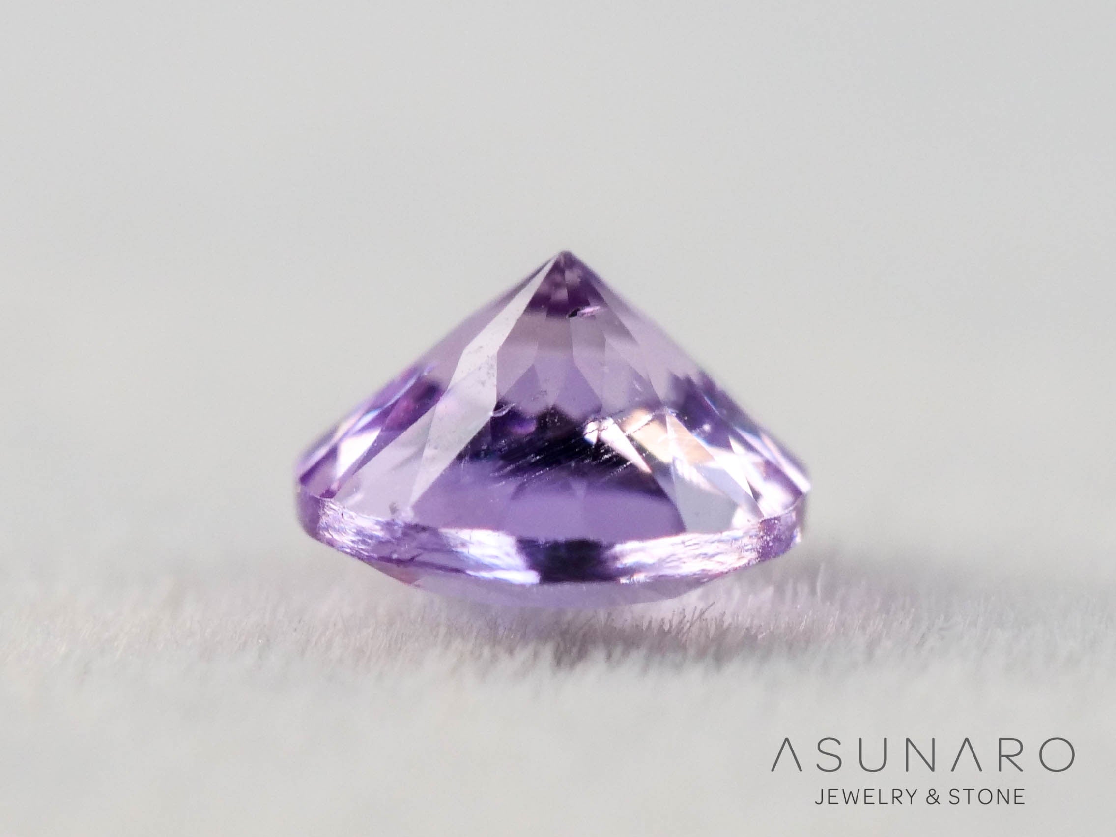 インペリアルトパーズ　ラウンドカット　0.18ct　ブラジル産　【251127-3049】