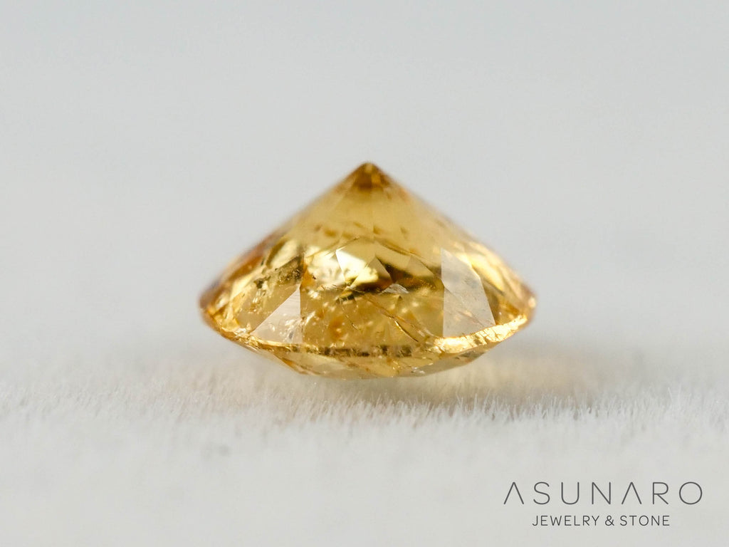 インペリアルトパーズ　ラウンドカット　0.24ct　ブラジル産　【251127-3048】