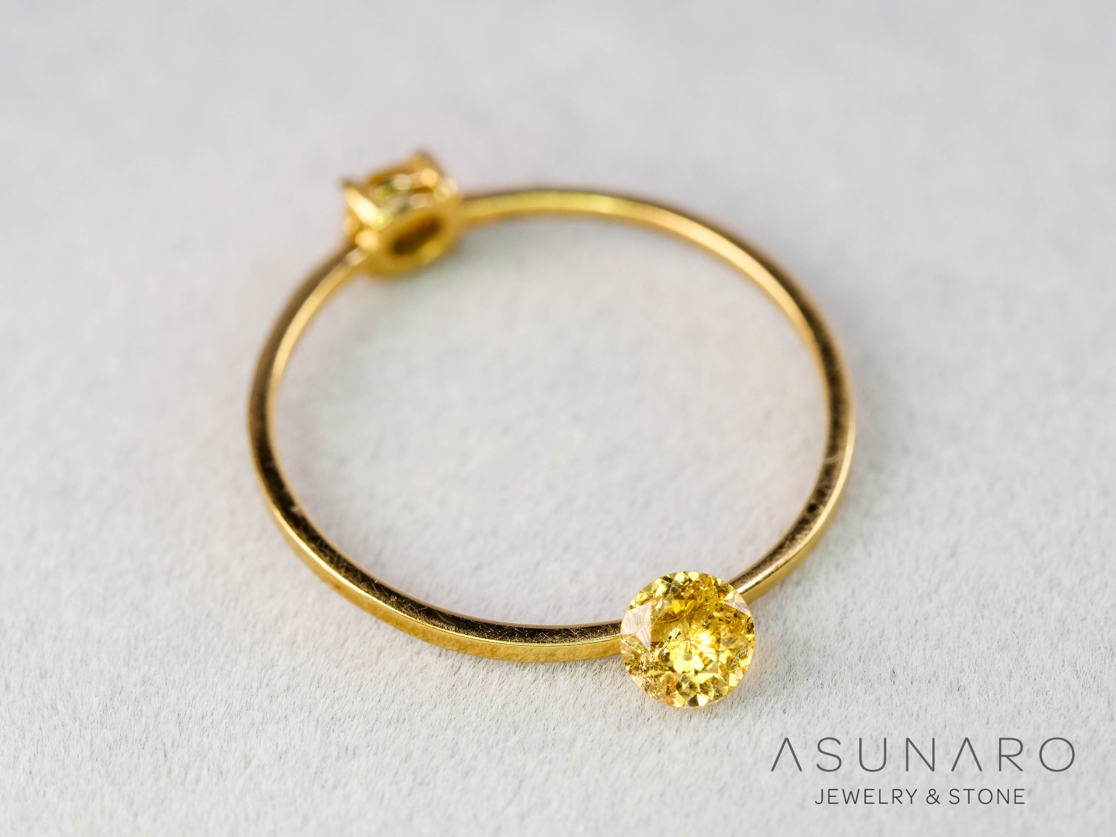 インペリアルトパーズ　ラウンドカット　0.24ct　ブラジル産　【251127-3048】