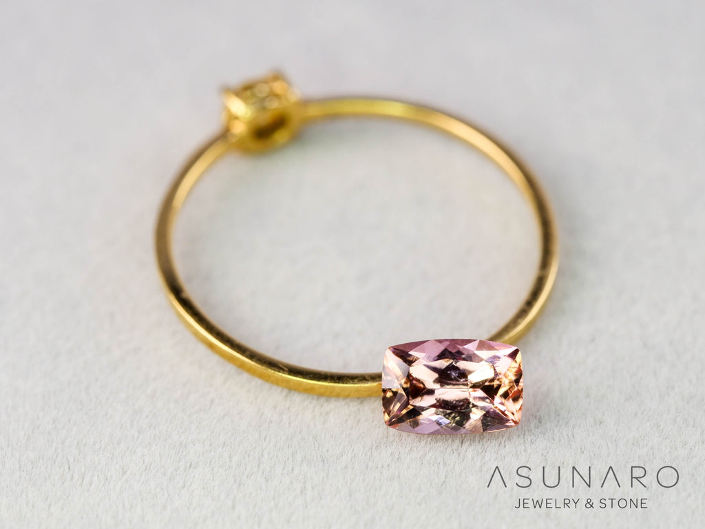 バイカラーインペリアルトパーズ　クッションカット　0.61ct　ブラジル産　【251127-3047】