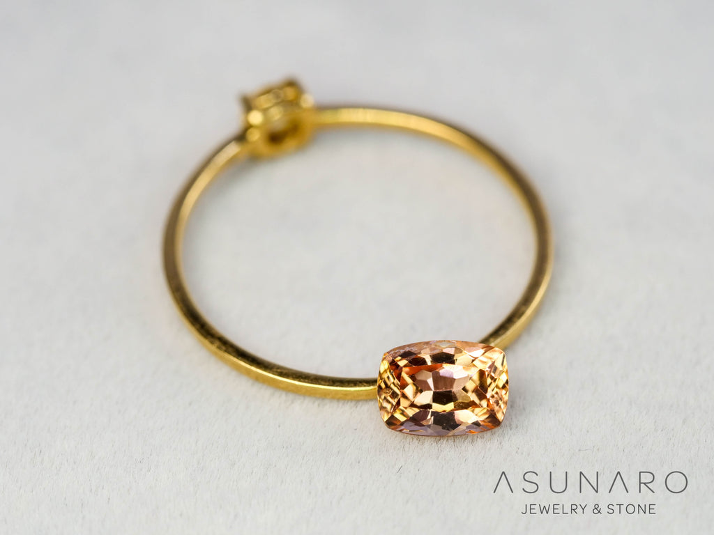 バイカラーインペリアルトパーズ　クッションカット　0.66ct　ブラジル産　【251127-3045】