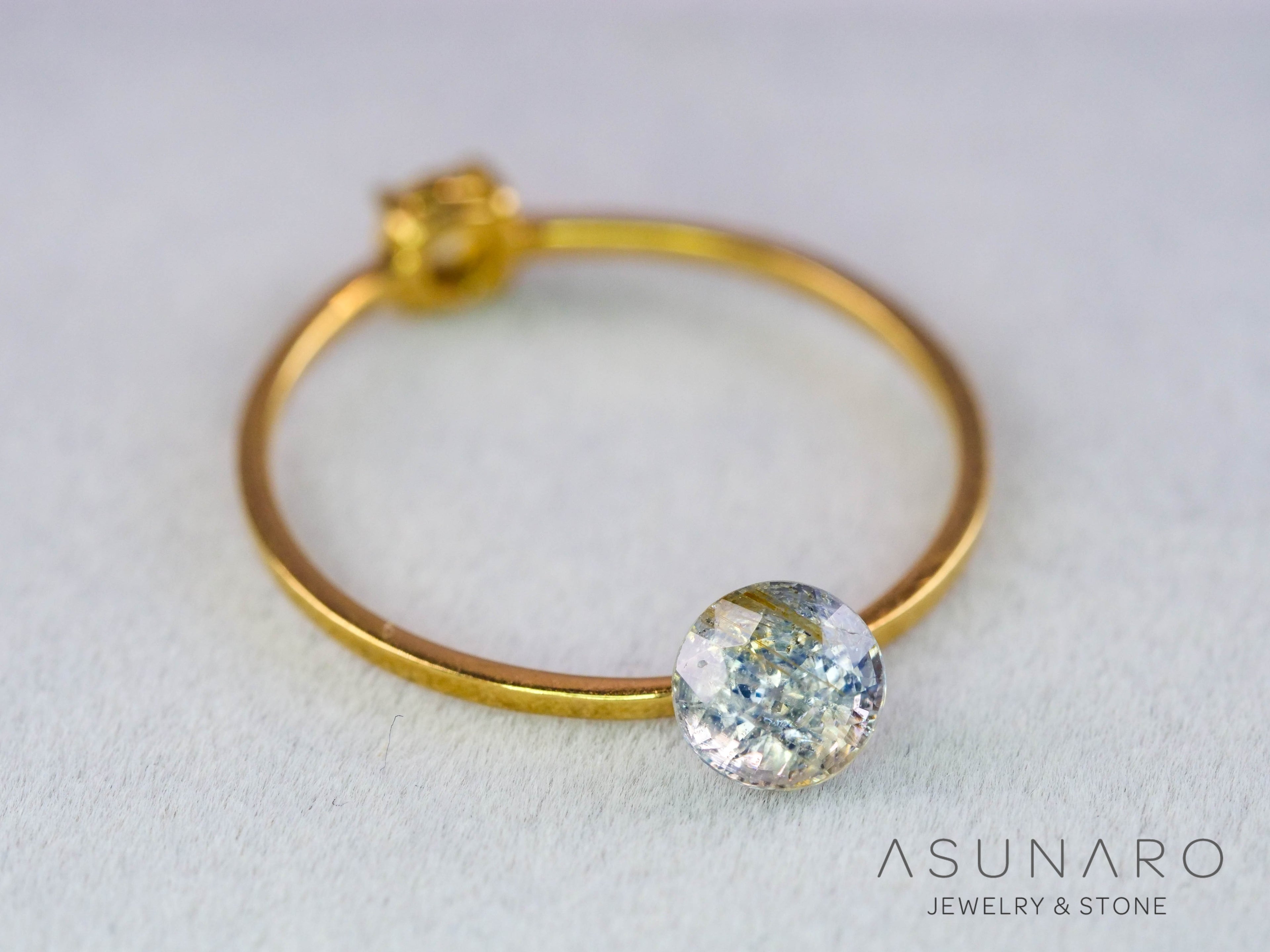 イリデッセンス入りサファイア 　ラウンドカット　スリランカ産　0.63ct　【260319-3257】