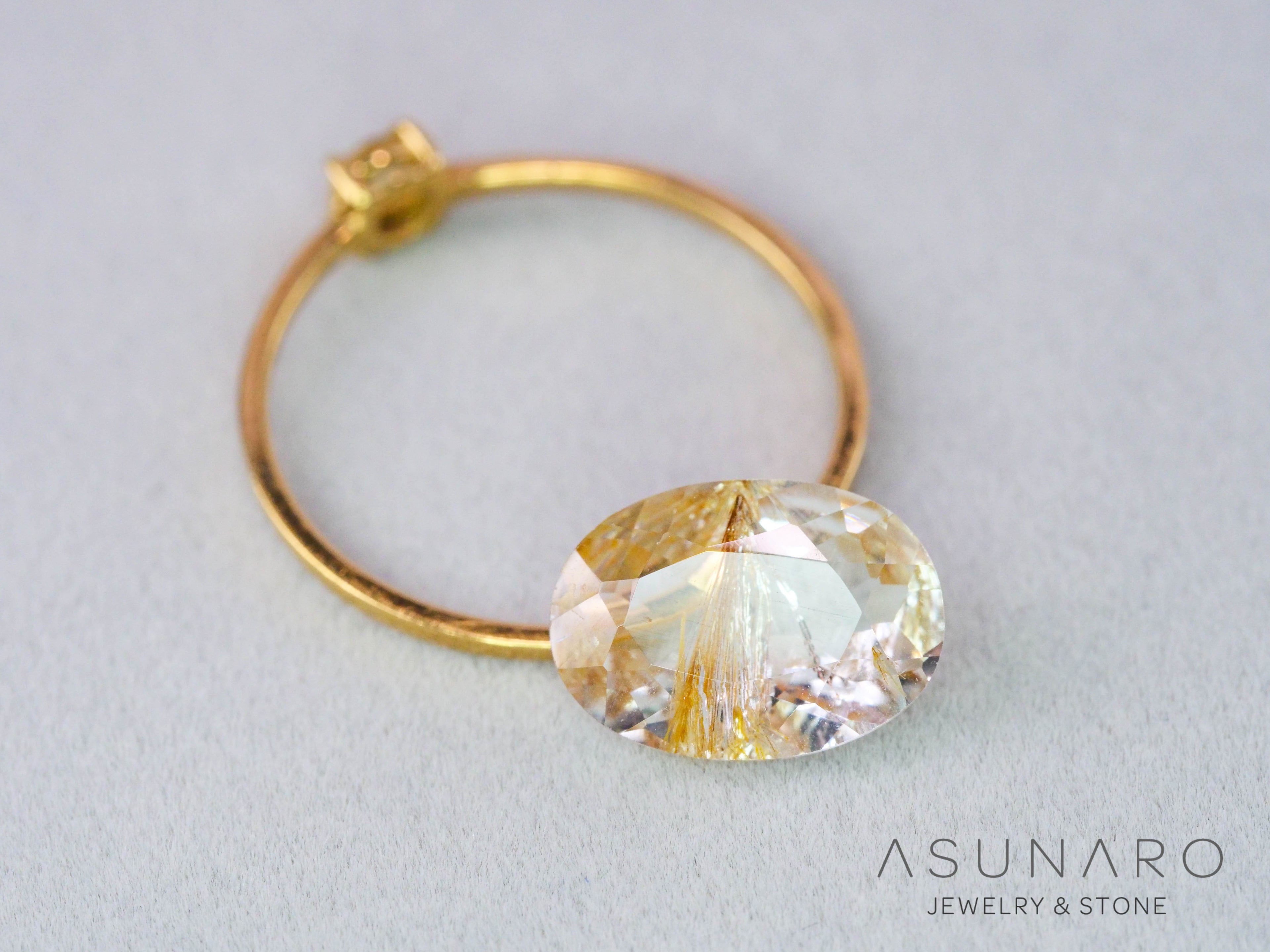 ルチルイントパーズ 　オーバルカット　ブラジル産　2.94ct　【260407-3330】