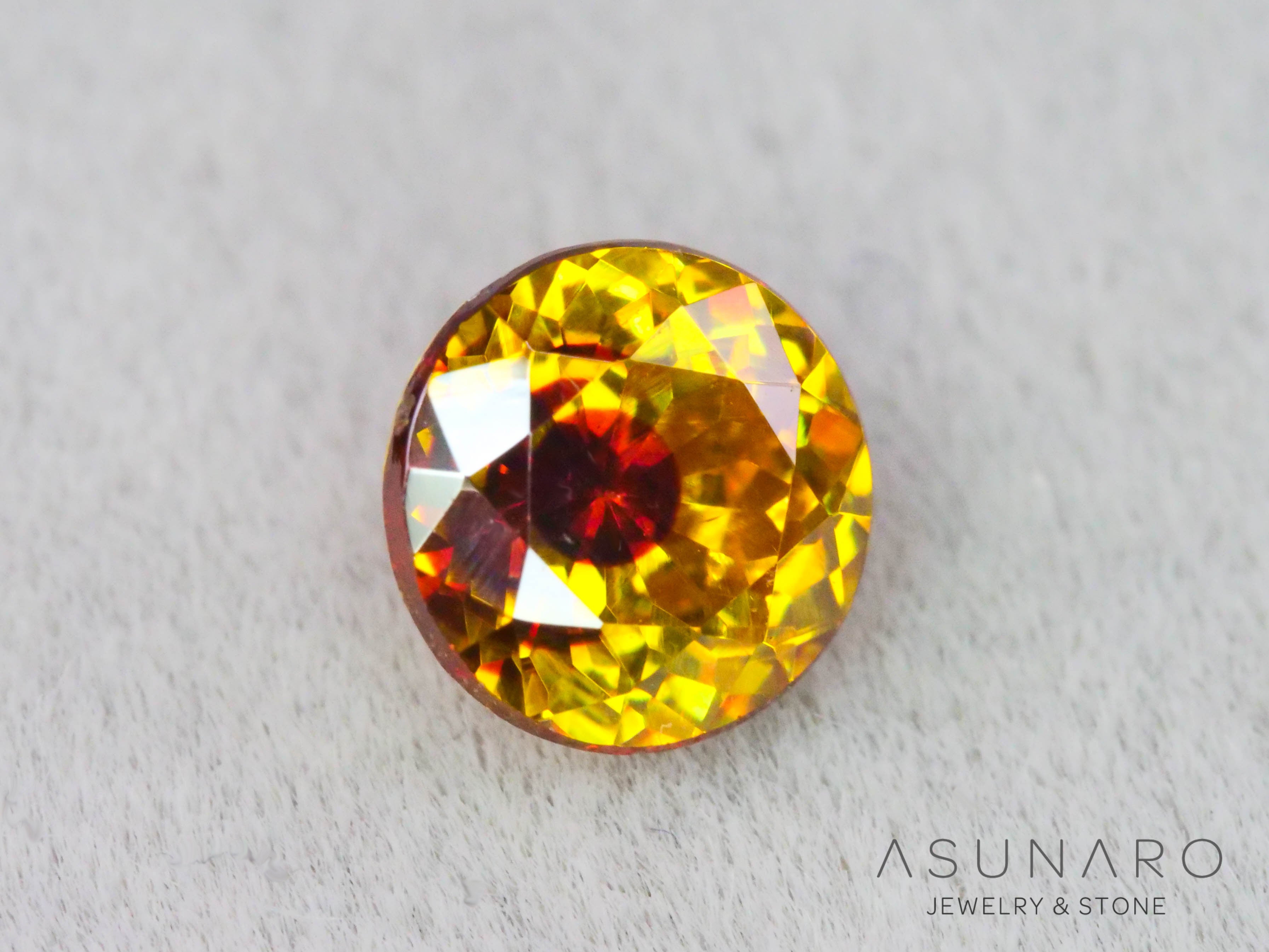 バイカラースファレライト ラウンドカット スペイン産 　0.52ct【260407-3293】