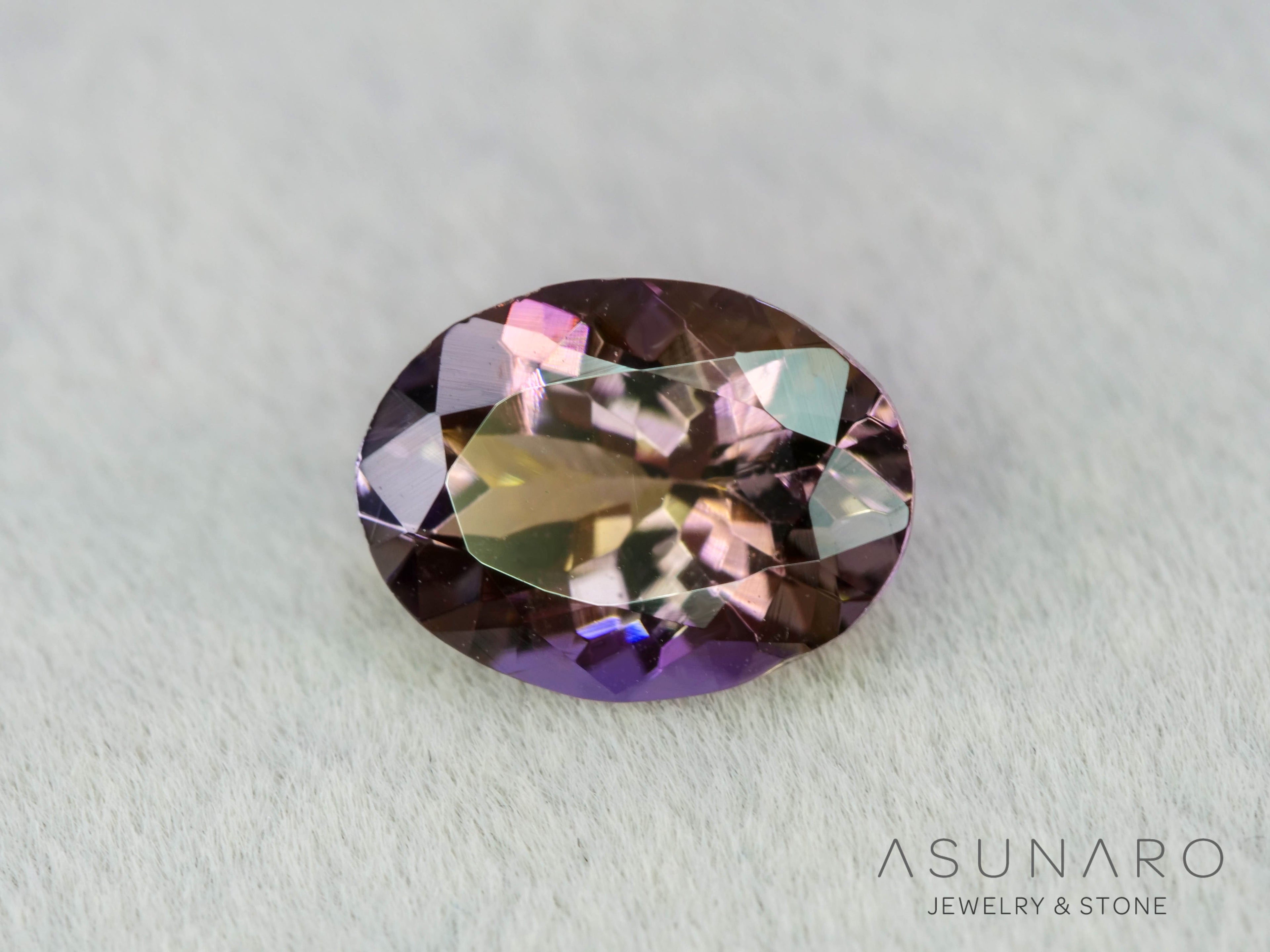 パーティーカラーゾイサイト　オーバルカット　タンザニア産　1.14ct【260703-3373】