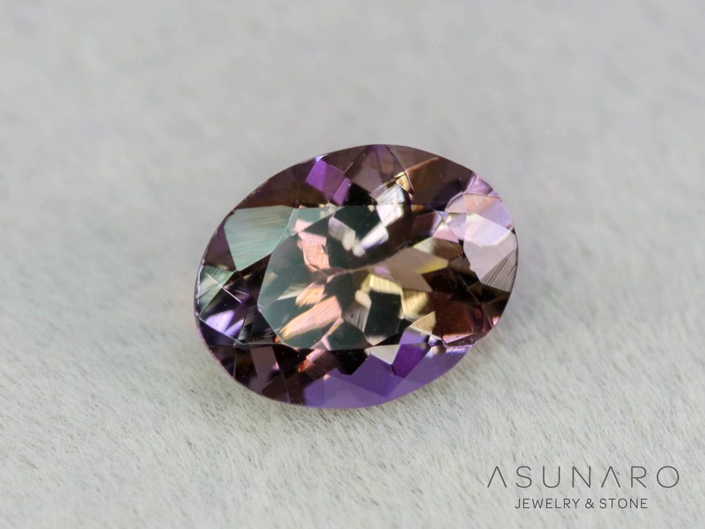 パーティーカラーゾイサイト　オーバルカット　タンザニア産　1.14ct【260703-3373】