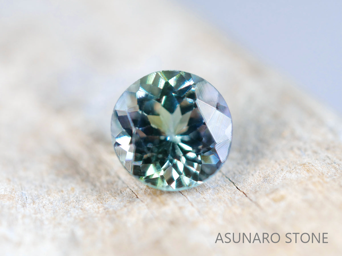 バイカラーゾイサイト ラウンドカット タンザニア産 0.66ct【sp210609-358】