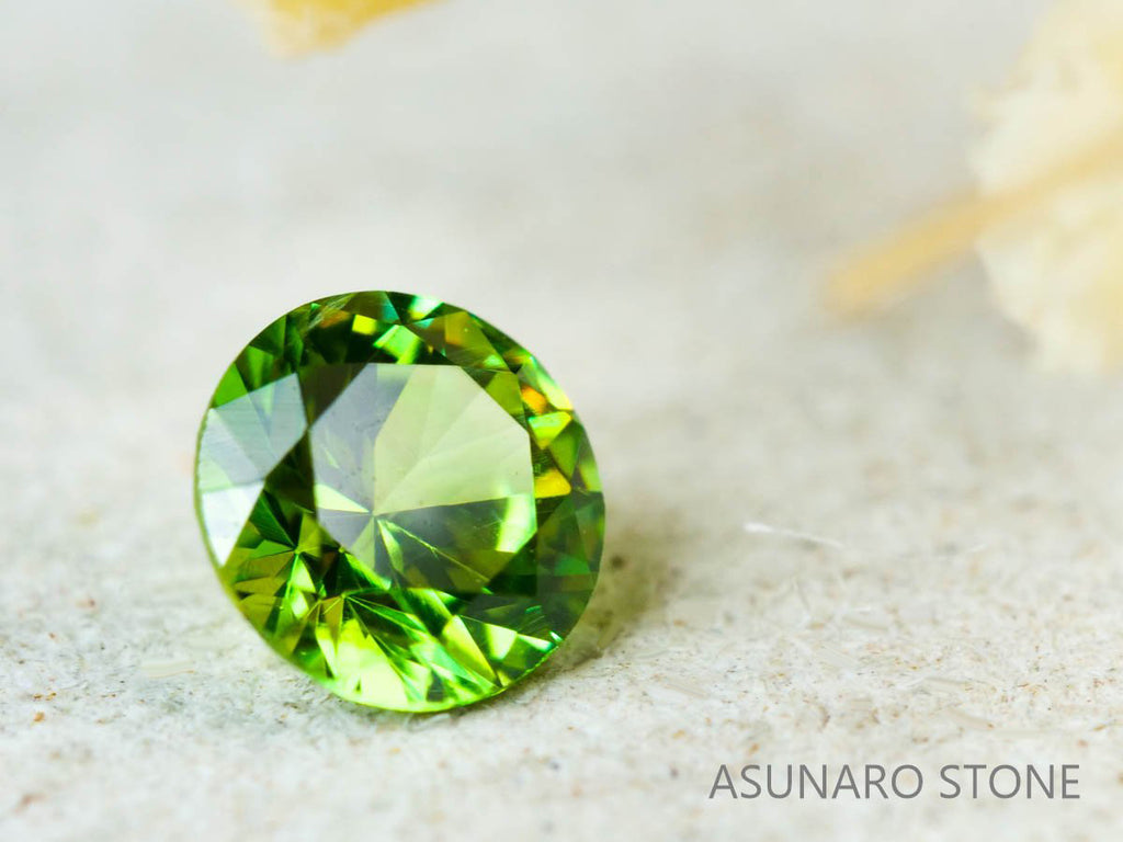 デマントイドガーネット ロシア産 ラウンドカット 0.12ct【211208-528】