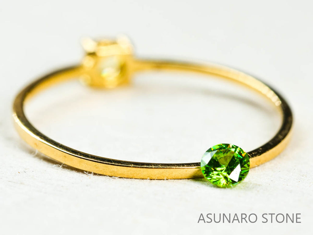 デマントイドガーネット ロシア産 ラウンドカット 0.12ct【211208-528】