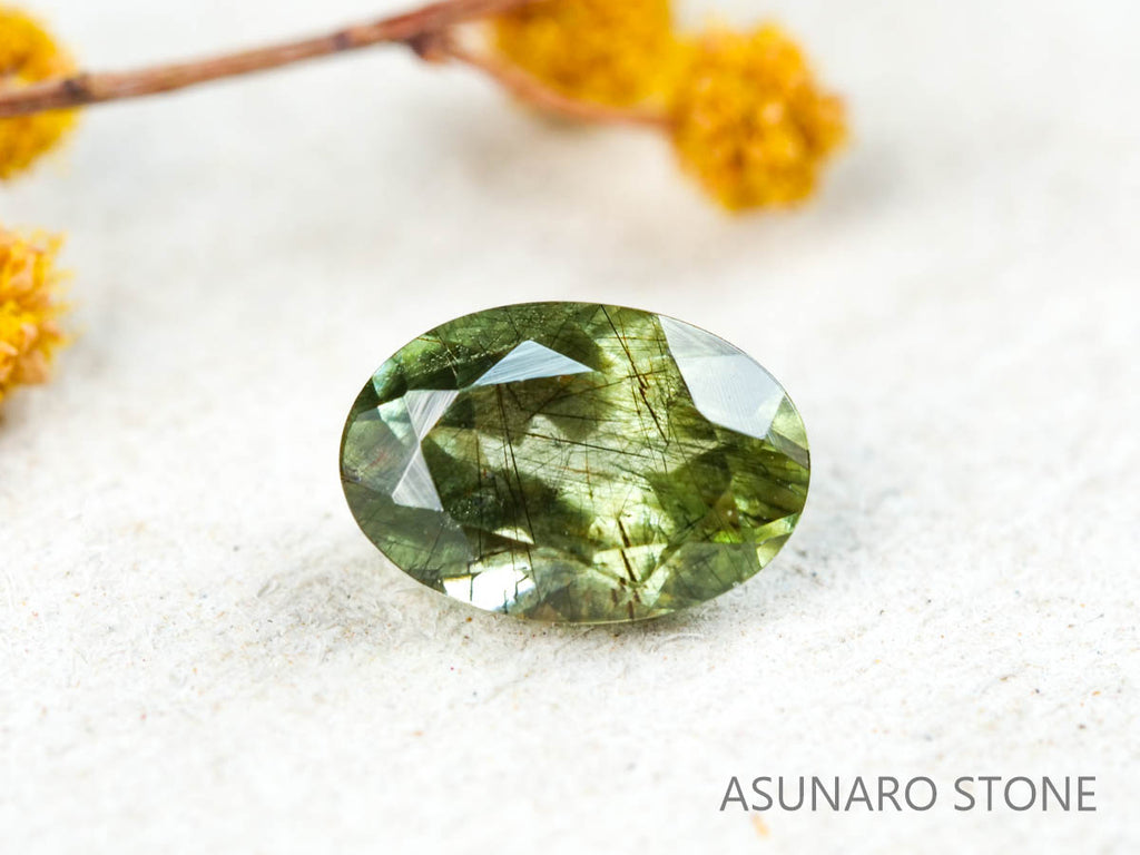 ルドウィジャイトインペリドット　オーバルカット　パキスタン産  0.57ct【211224-255】