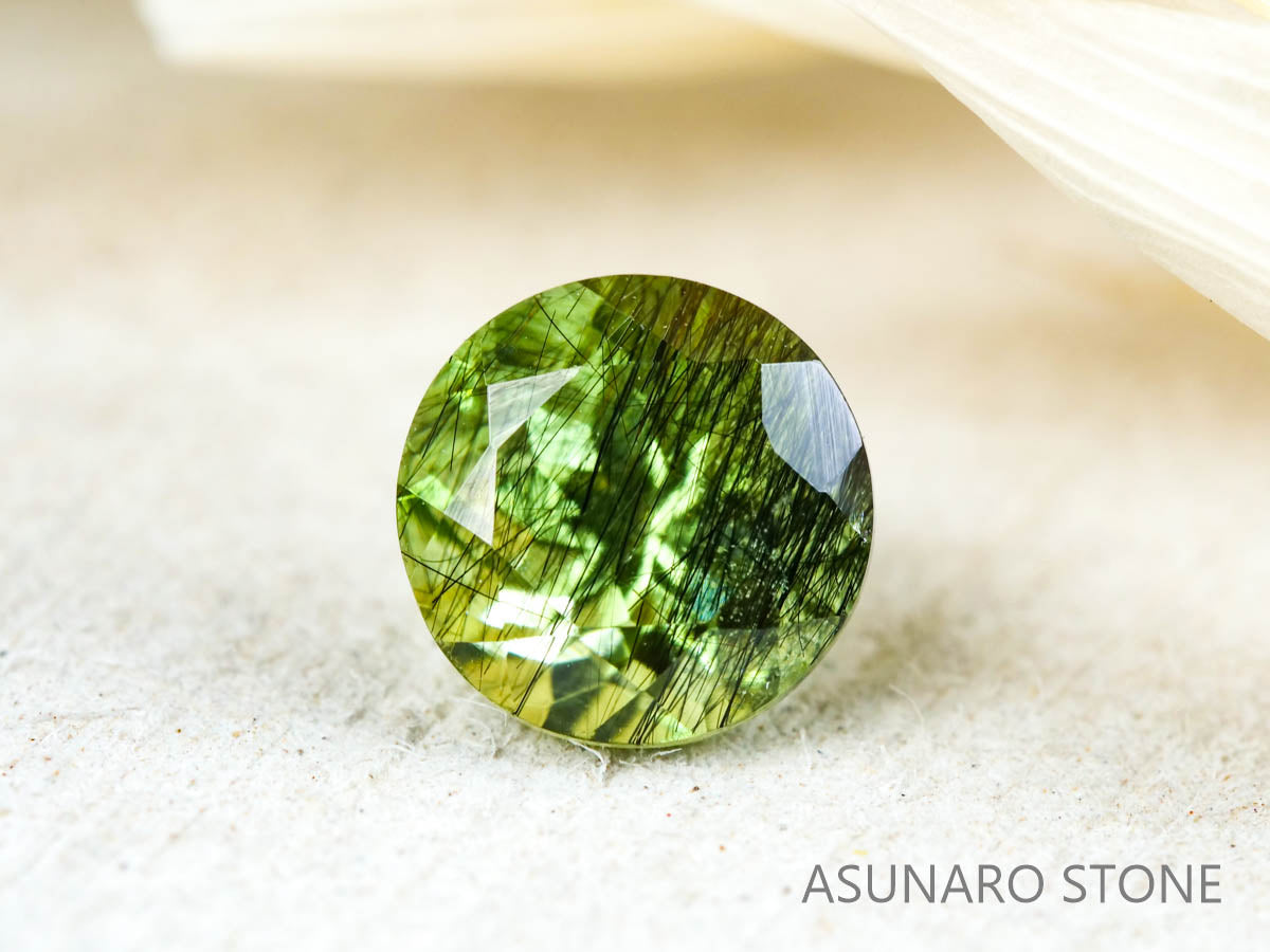 ルドウィジャイトインペリドット　ラウンドカット　パキスタン産   1.15ct【211224-258】