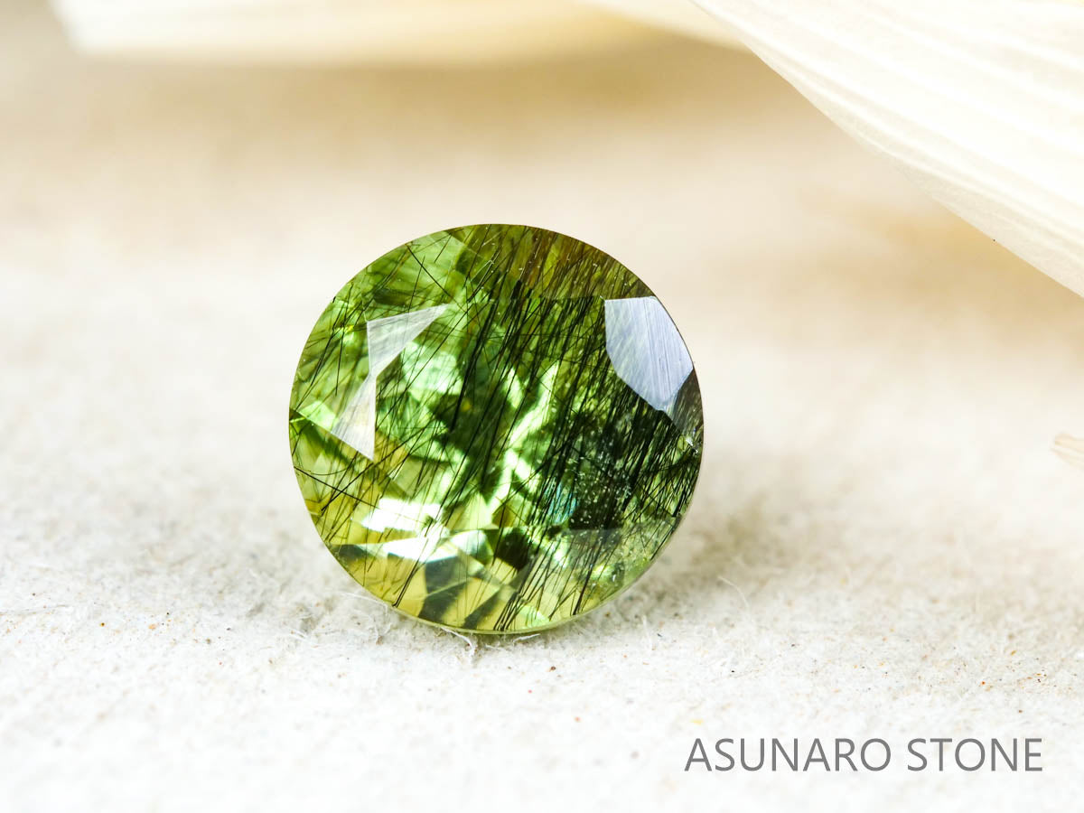 ルドウィジャイトインペリドット　ラウンドカット　パキスタン産   1.15ct【211224-258】