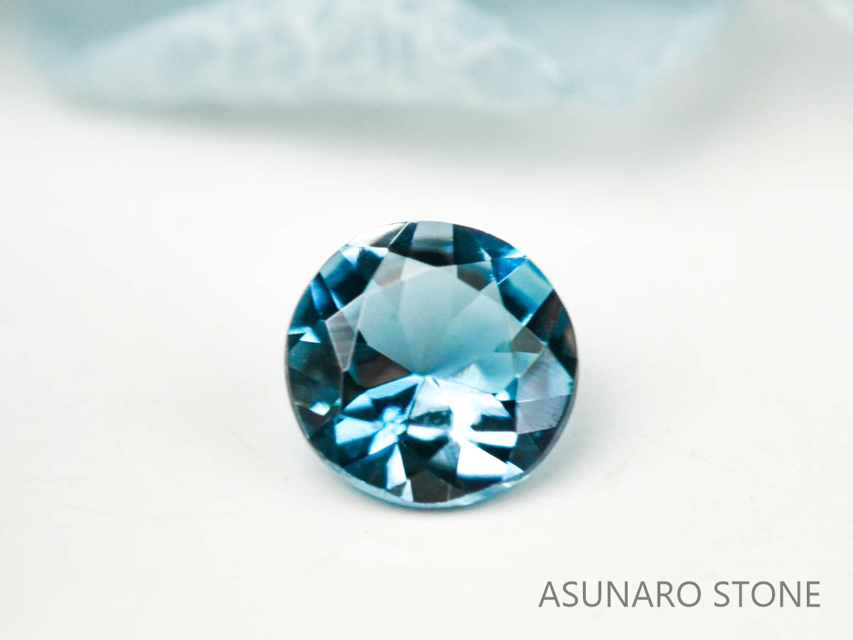 サンタマリアアクアマリン  ラウンドカット　ブラジル・タトゥー鉱山産　0.09ct【221021-1195】