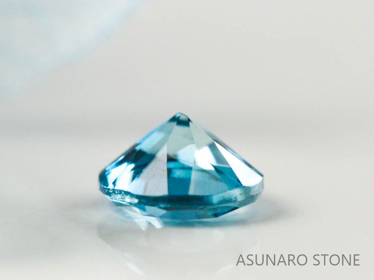 サンタマリアアクアマリン  ラウンドカット　ブラジル・タトゥー鉱山産　0.09ct【221021-1195】