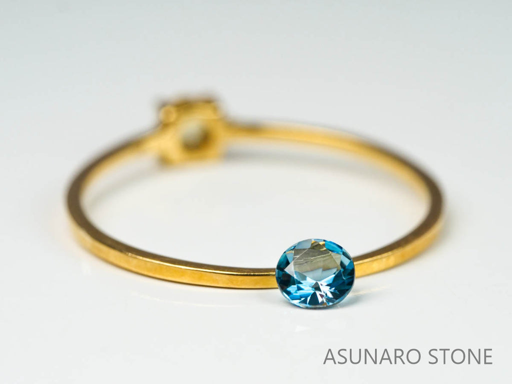 サンタマリアアクアマリン  ラウンドカット　ブラジル・タトゥー鉱山産　0.09ct【221021-1195】
