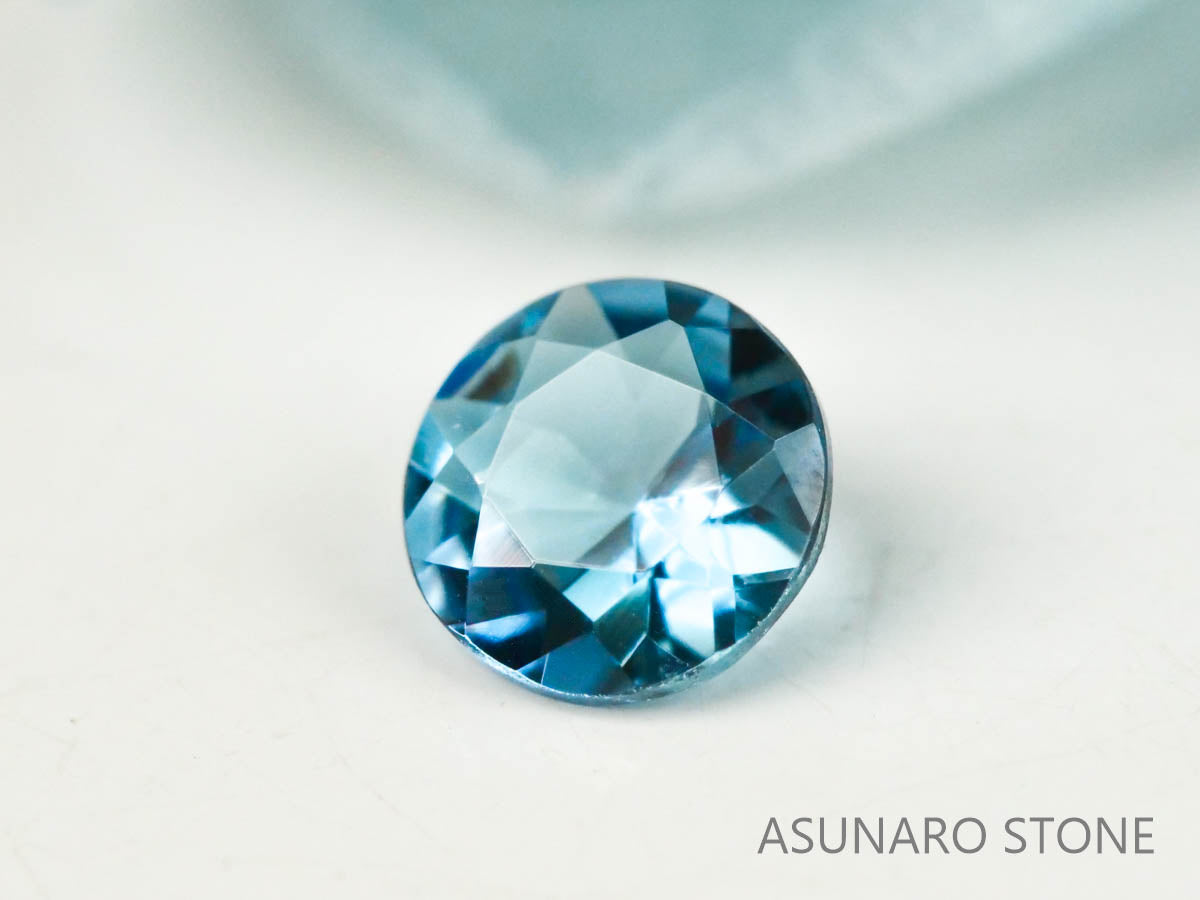 サンタマリアアクアマリン　ラウンドカット ブラジル・タトゥー鉱山産　0.09ct【221021-1198】