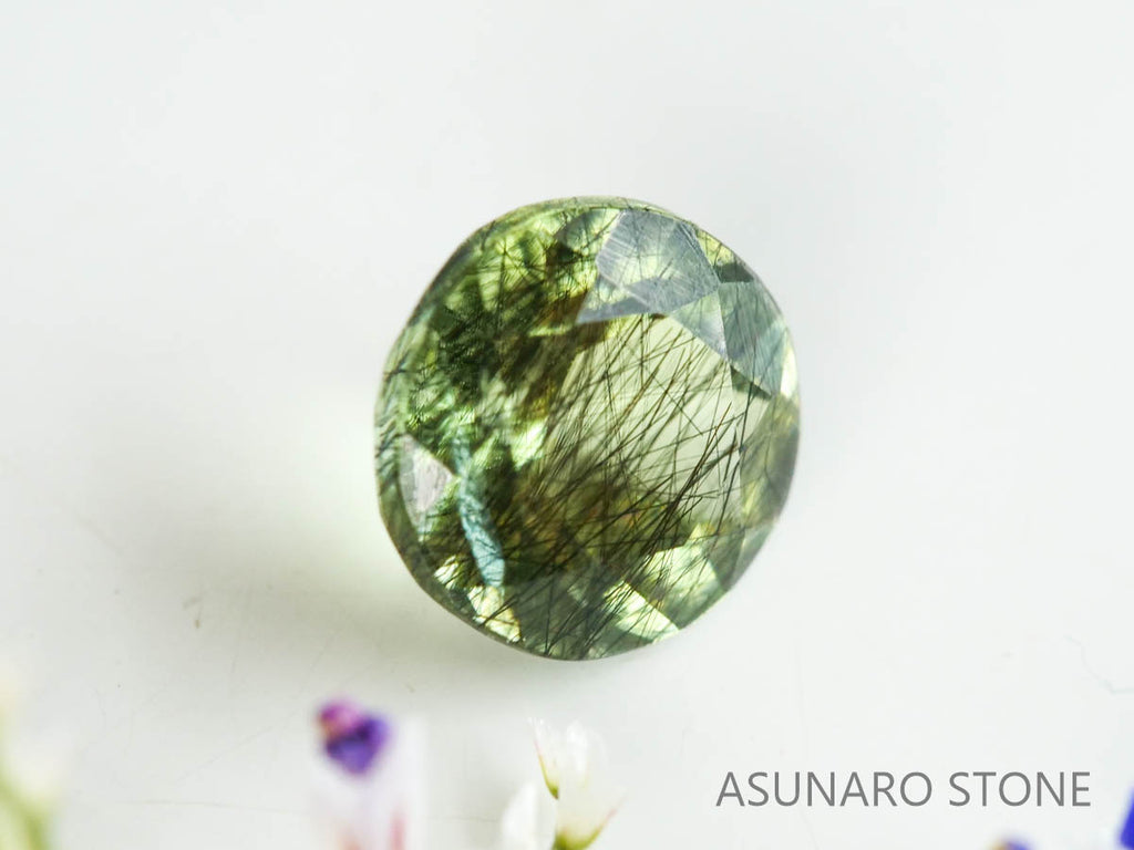 ルドウィジャイトインペリドット（ルチルペリドット）　ラウンドカット　パキスタン産   0.52ct【221226-1338】