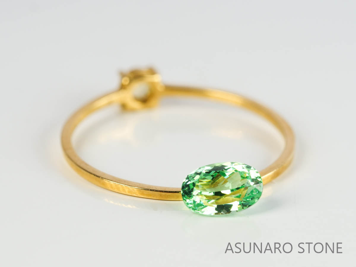 UVミントガーネット　タンザニア産　オーバルカット　0.60ct　【220301-1374】