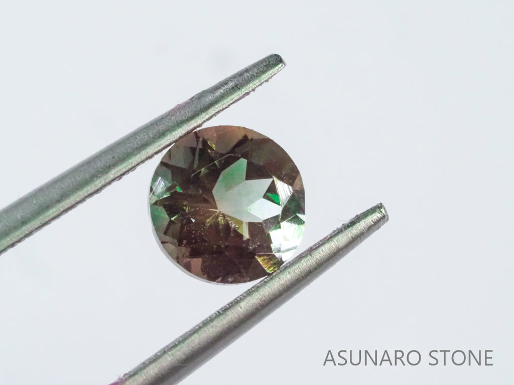 バイカラーオレゴンサンストーン ラウンドカット アメリカ産 0.81ct【os21040289】