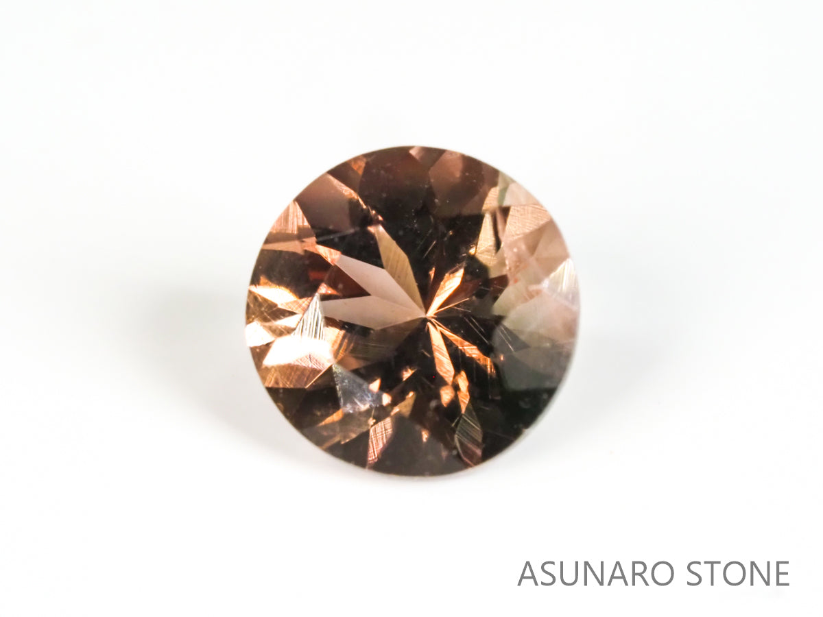 バイカラーオレゴンサンストーン ラウンドカット アメリカ産 0.73ct【os2105295】