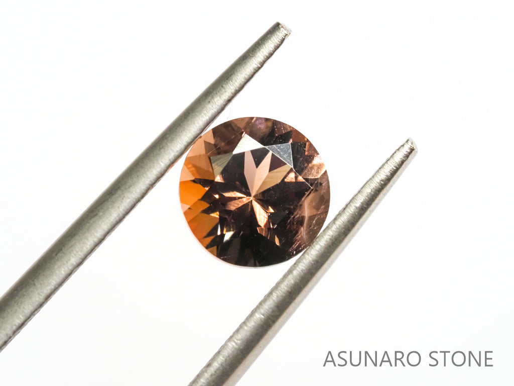 バイカラーオレゴンサンストーン ラウンドカット アメリカ産 0.73ct【os2105295】