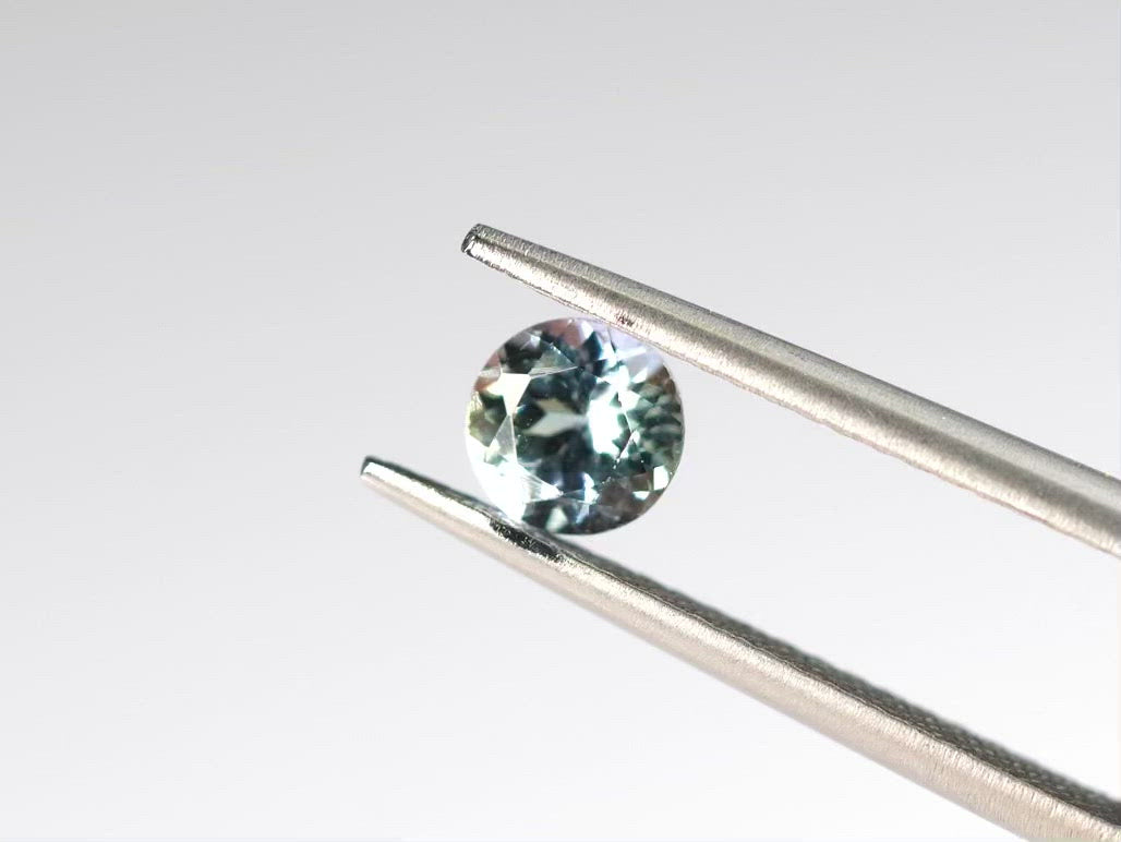 バイカラーゾイサイト ラウンドカット タンザニア産 0.66ct【sp210609-358】